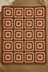 Cozy crochet squirrel granny baby blanket in soft colors and textures.